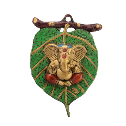 HomeSutra Lord Ganesha in Red Dhoti on Green Leaf Wall Hanging